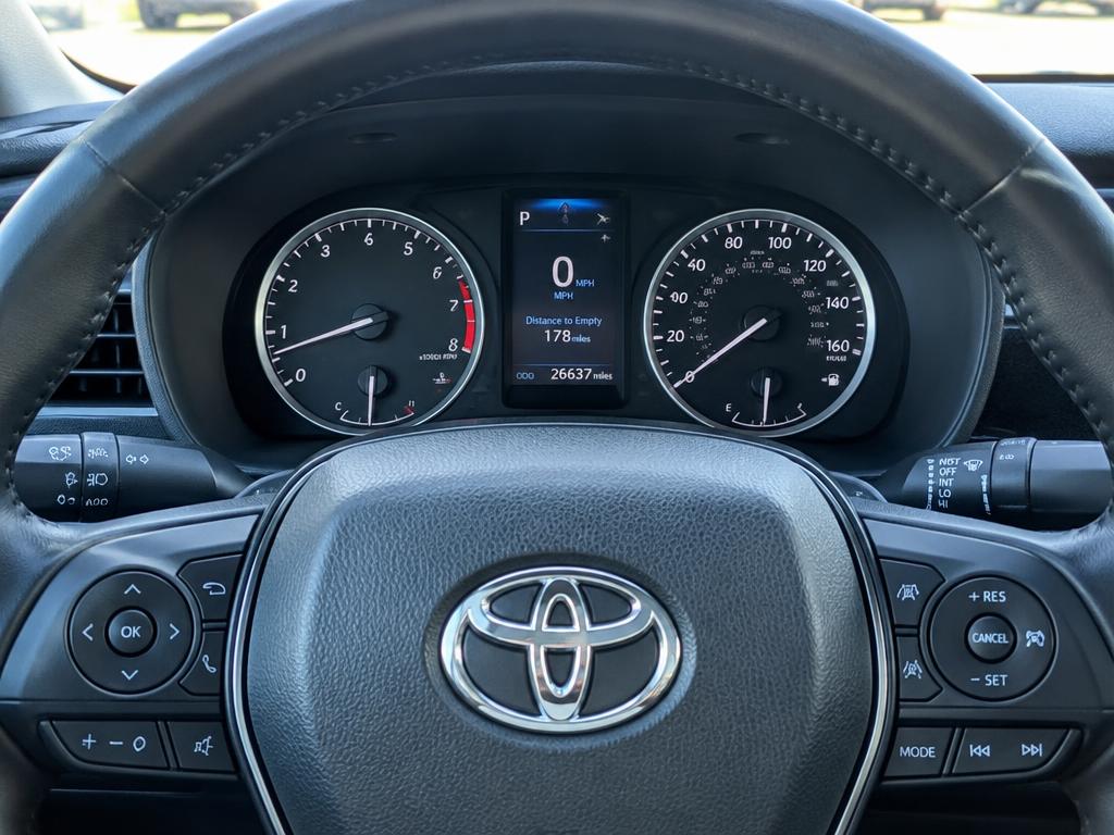 Vehicle information documented in a listing photograph