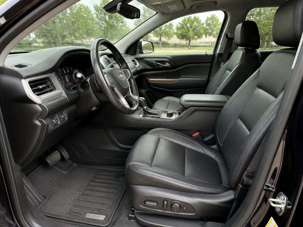 Wide-angle interior photograph of a clean leather cabin
